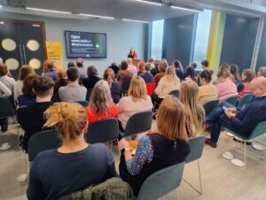 Hannah Smith giving a presentation in Bristol