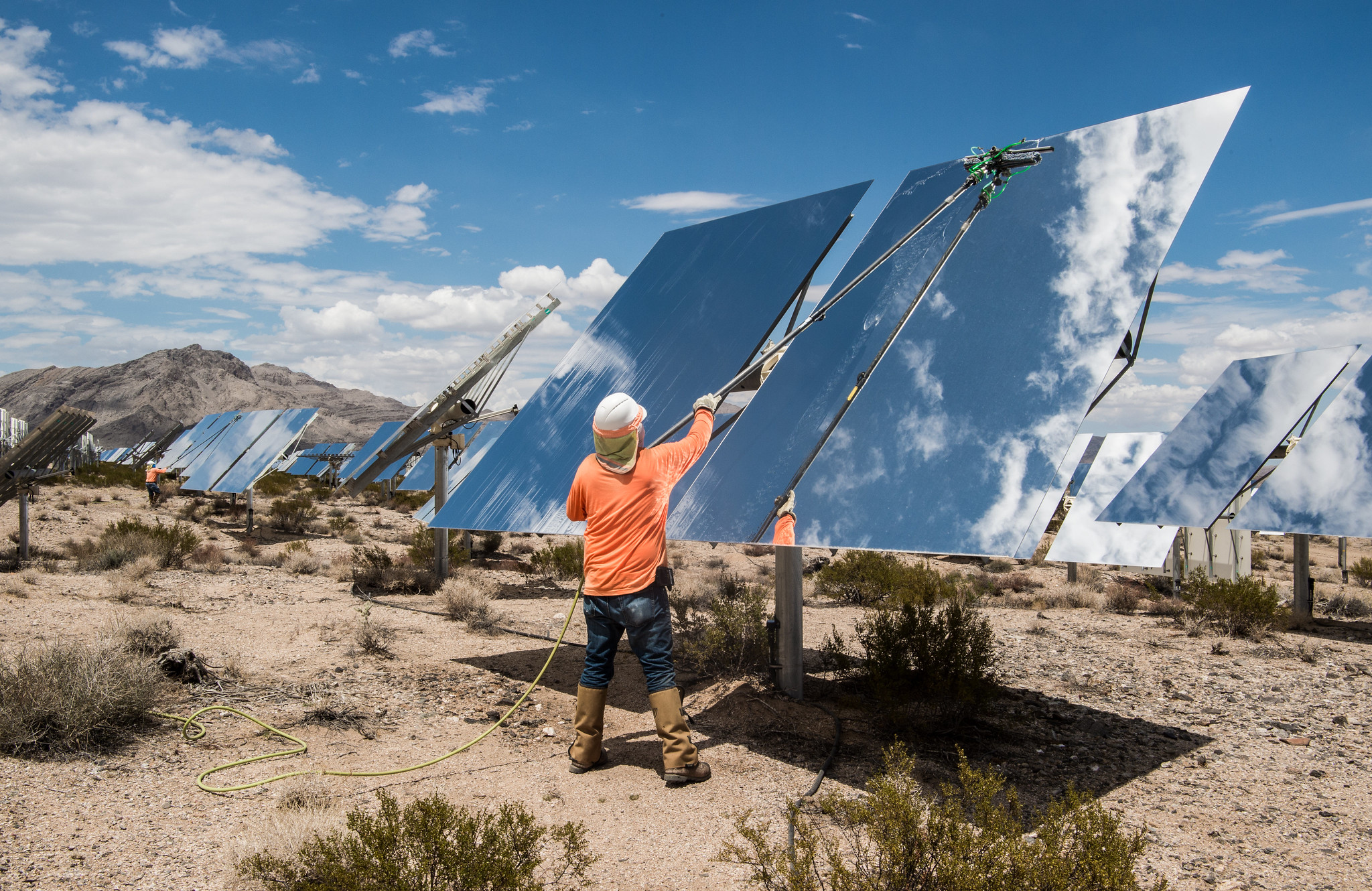 Contracted workers clean Heliostats at the Ivanpah Solar Project, owned by NRG Energy, Bright Source Energy,Bechtel and Google
